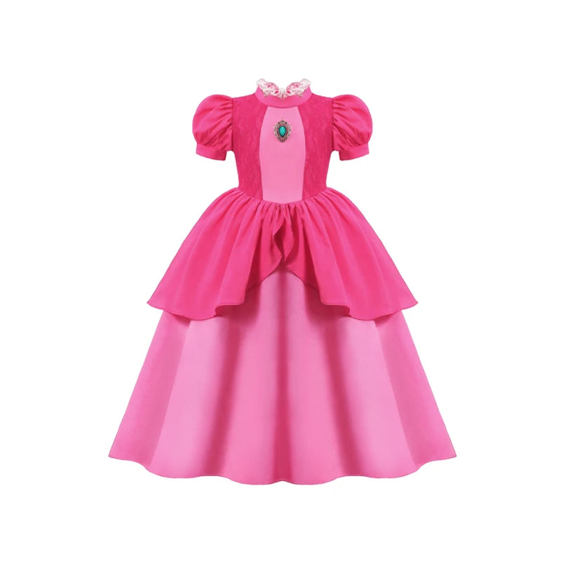 Pink dress with a green gem on a white background