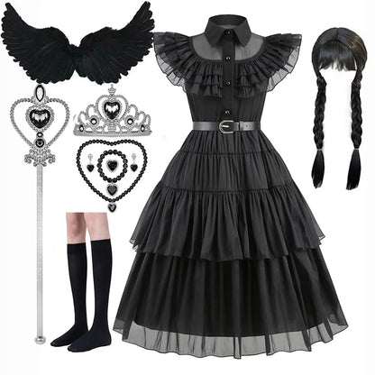 Black gothic dress with accessories including a tiara, heart-shaped key, and black wings on a white background.