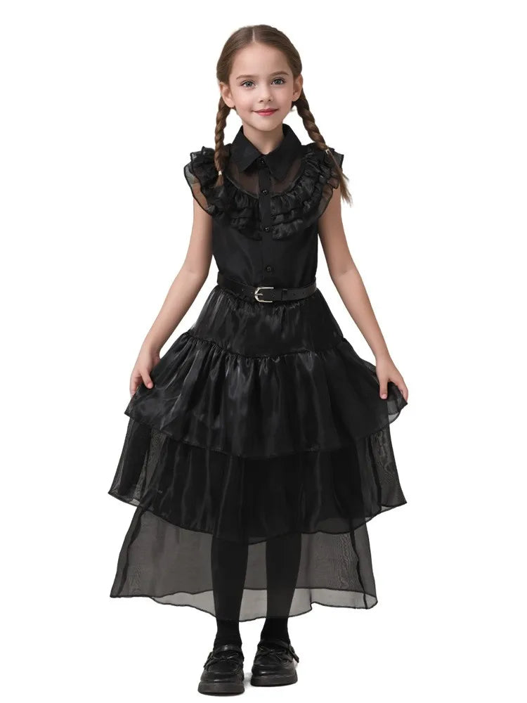 Girl wearing a black gothic-style dress on a white background
