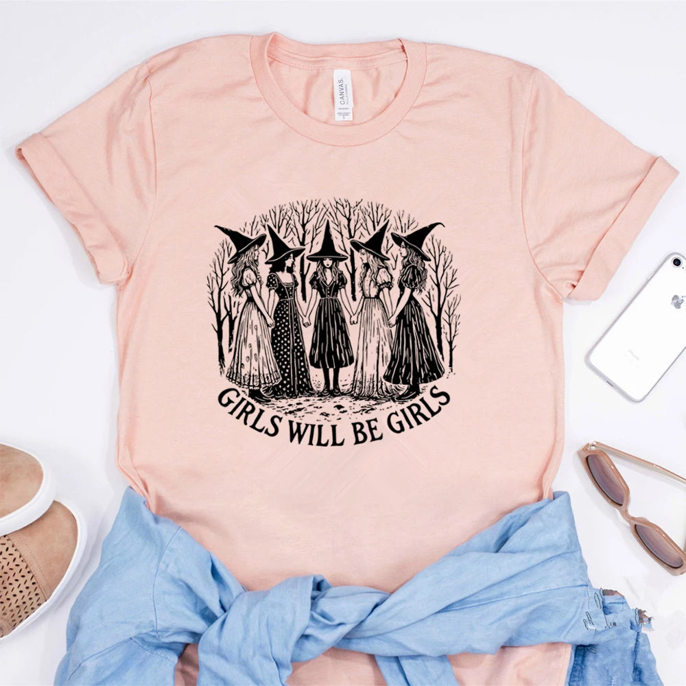 Pink t-shirt with black graphic and 'Girls Will Be Girls' text on a white background