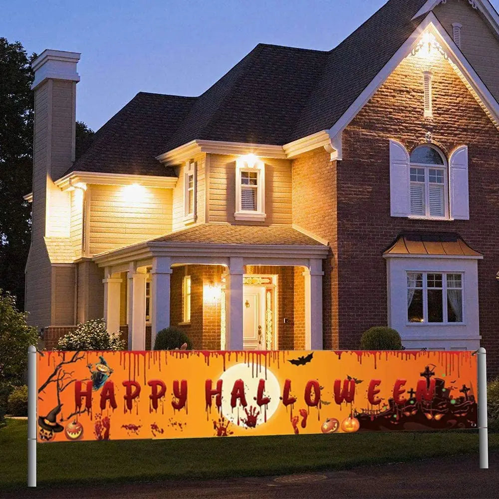 Halloween banner with 'Happy Halloween' text and decorations in front of a house.