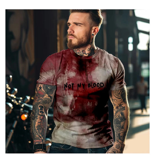 Man wearing a red and white t-shirt with 'Not My Blood' text, standing outdoors.