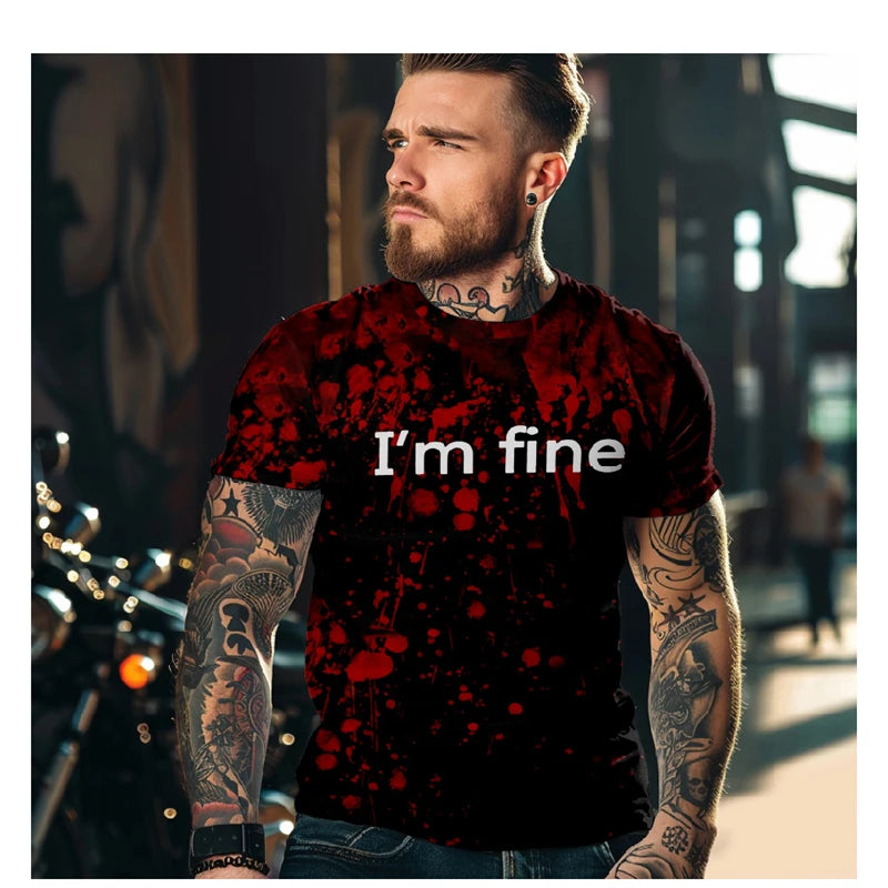 Man wearing a red and black patterned t-shirt with 'I'm fine' text, standing outdoors.