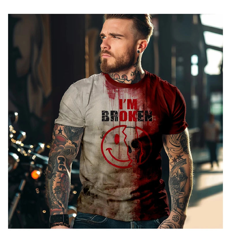Man wearing a red and gray t-shirt with 'I'm Broken' graphic design.