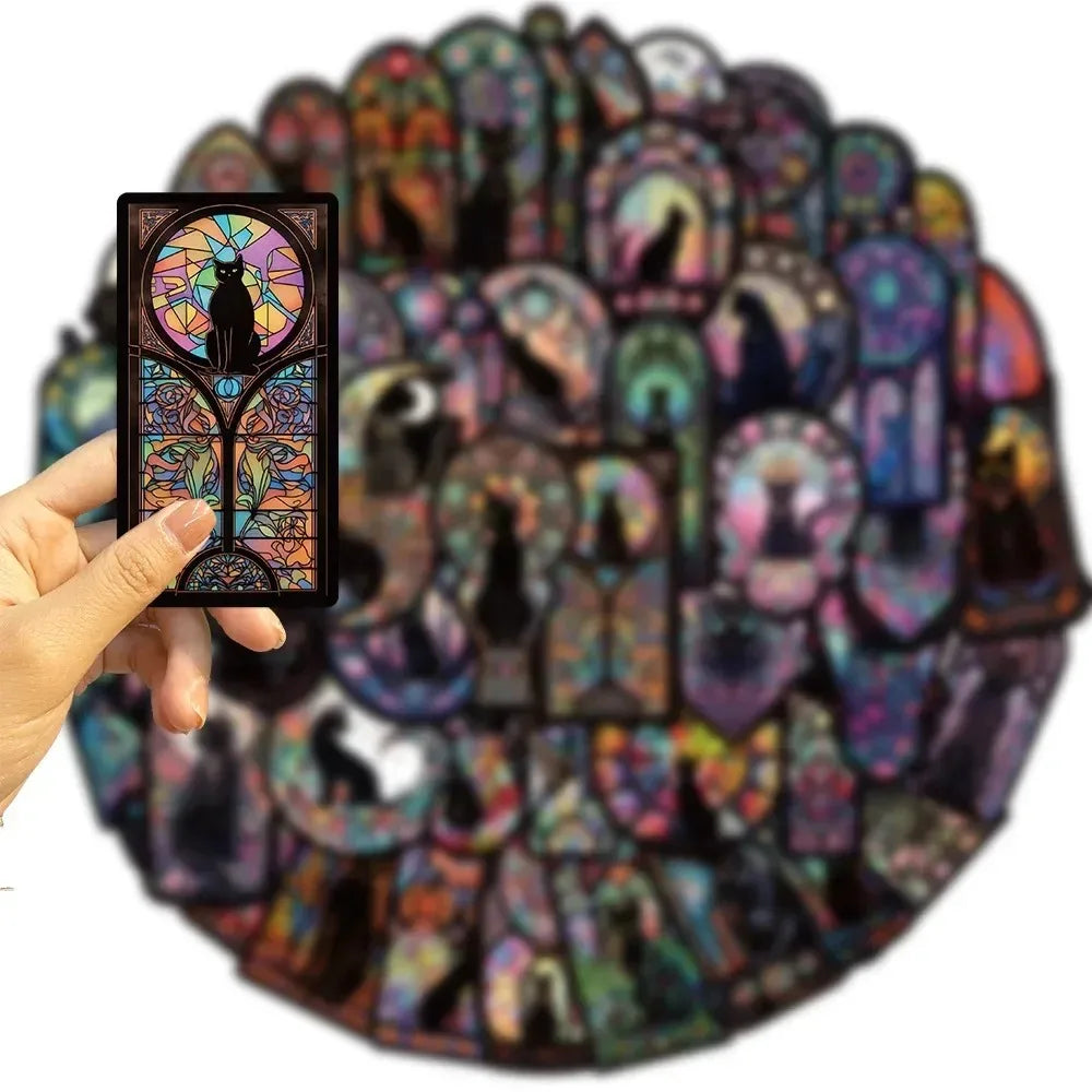 Colorful tarot cards with a hand holding one card against a white background