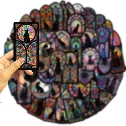 Colorful tarot cards with a hand holding one card against a white background