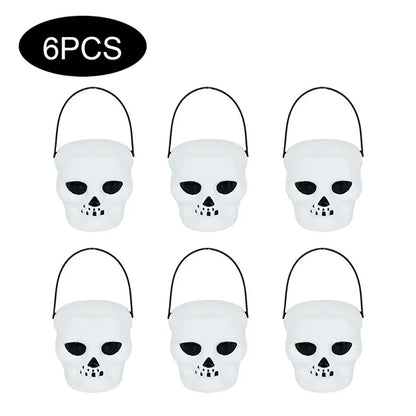 Six Halloween skull buckets with black handles on a white background.