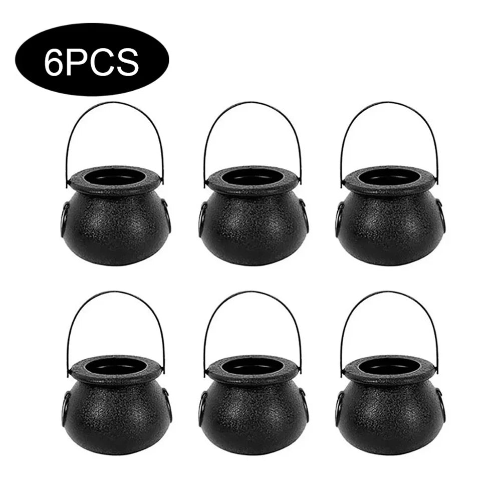 Set of six black cauldron-shaped lanterns with handles on a white background.