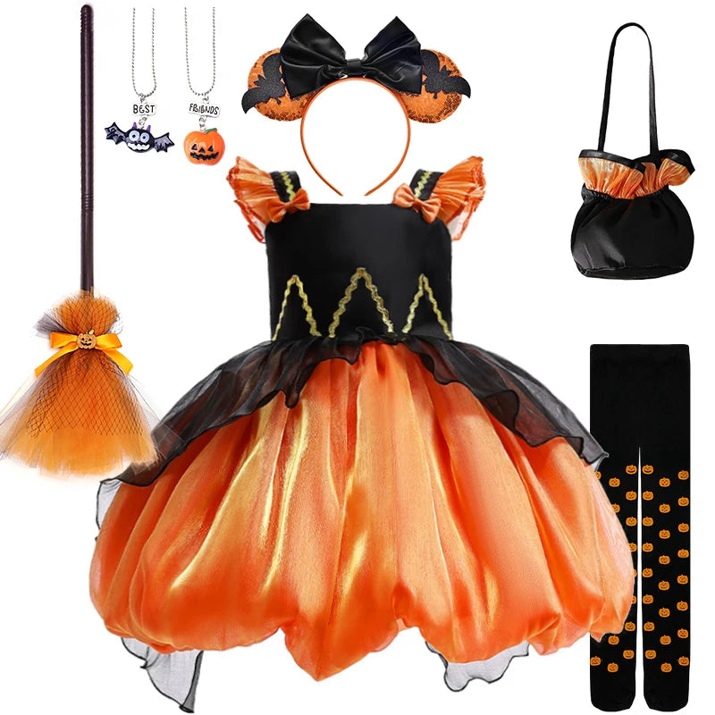 Halloween costume set with dress, headband, bag, broom, and socks on a white background