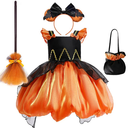 Halloween-themed children's costume set with dress, headband, broom, and bag on a white background