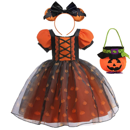 Halloween-themed children's dress with matching headband and pumpkin basket on a white background