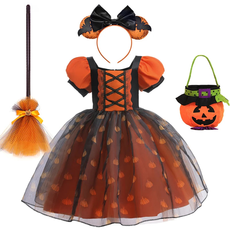 Halloween-themed children's costume set with dress, headband, broom, and pumpkin basket on a white background.
