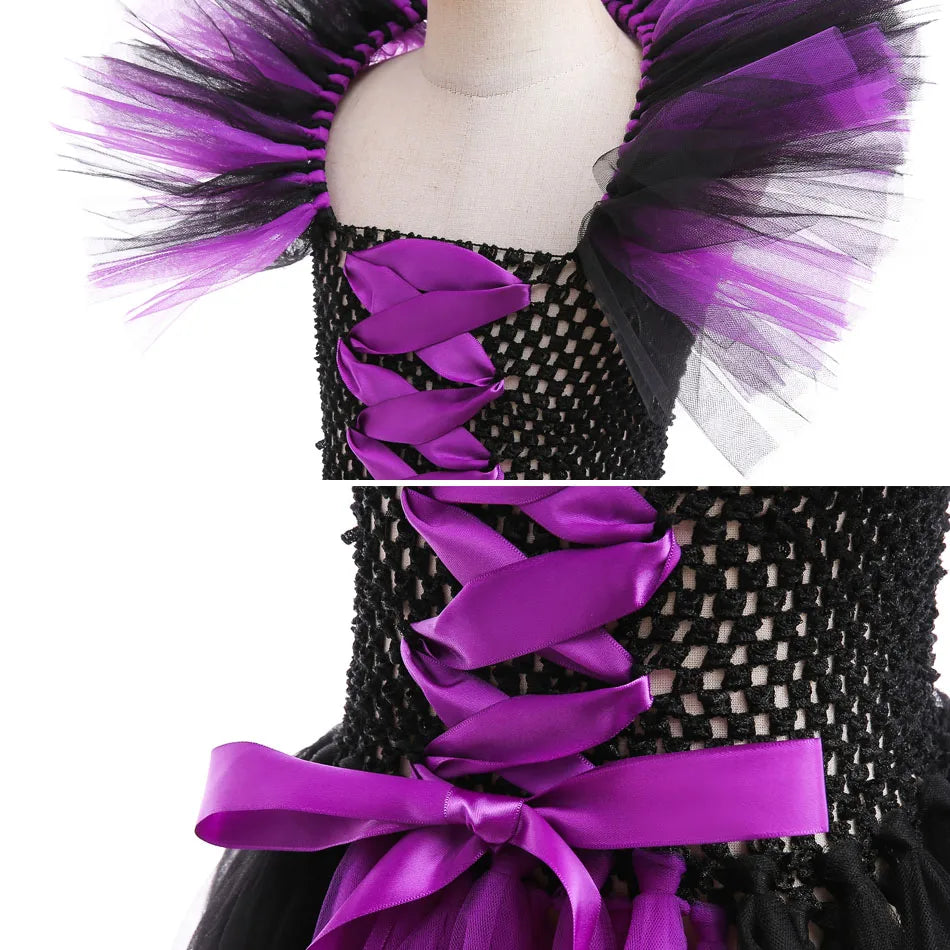 Black and purple tutu dress with a close-up of the purple ribbon on a white background