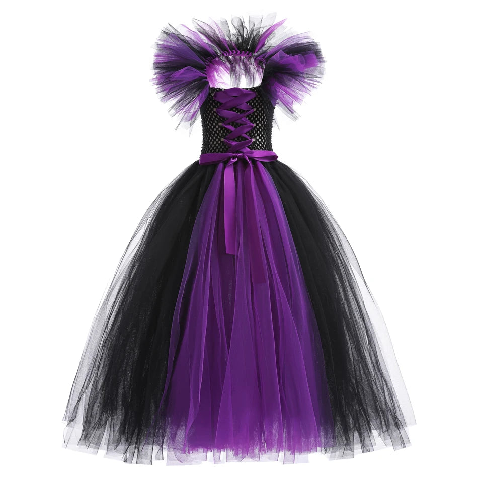 Black and purple dress with a tutu-style skirt on a white background