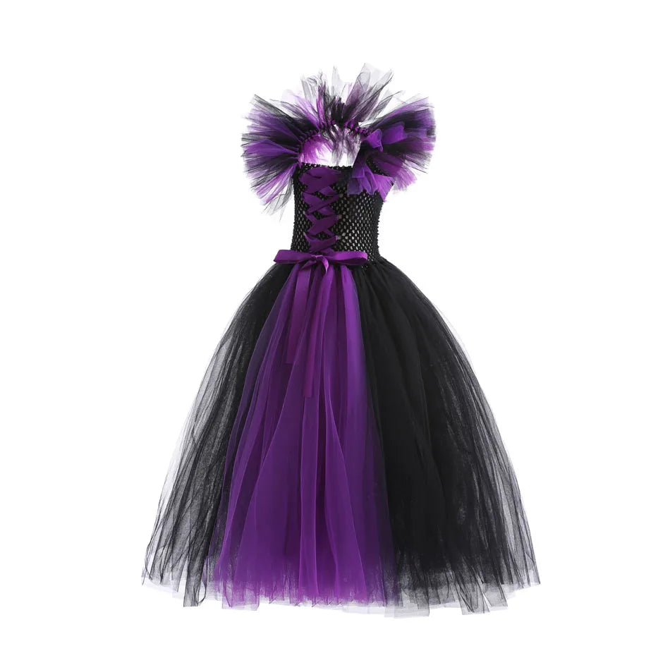 Black and purple dress with a tutu skirt on a white background
