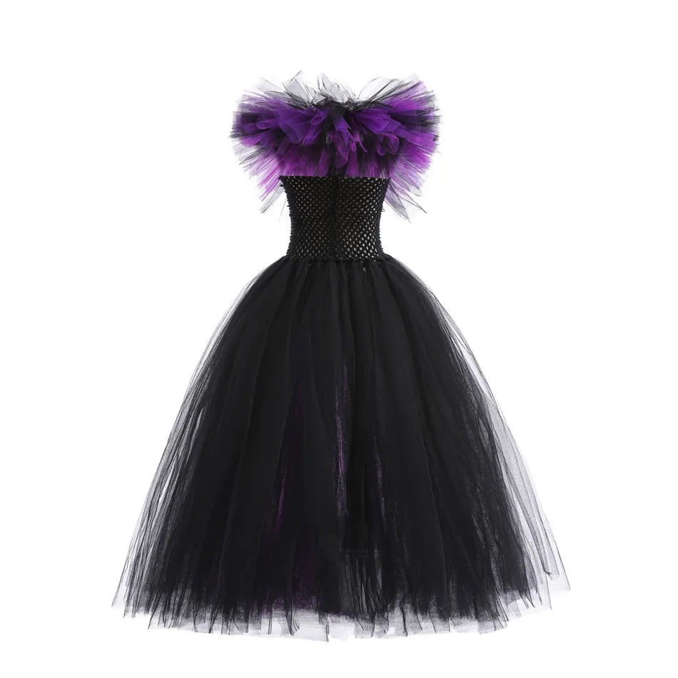 Black dress with purple feathered top on a white background