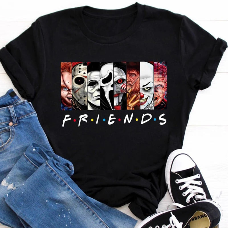 Black t-shirt with graphic design and 'FRIENDS' text, paired with jeans and sneakers.