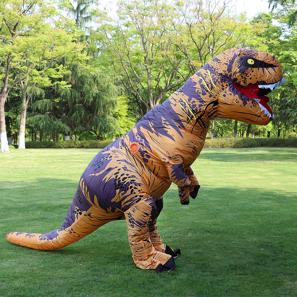 Inflatable T-Rex costume on a grassy field with trees in the background