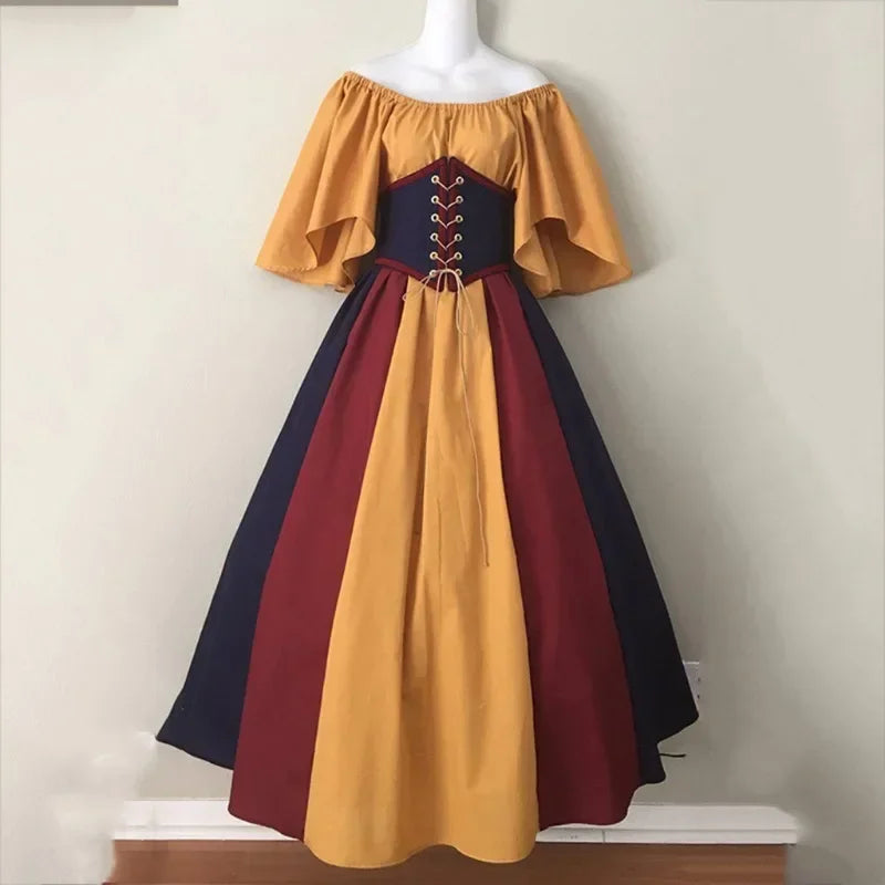 Multicolored off-shoulder dress on a mannequin against a plain background